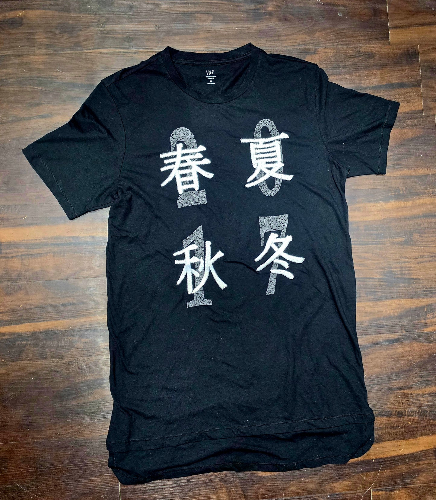 INC International Concepts Embroidered Asian design T-shirt featuring Chinese characters that say Spring (Top left), Summer (top right), Atumn/Fall (Bottom left), Winter (Bottom right)
