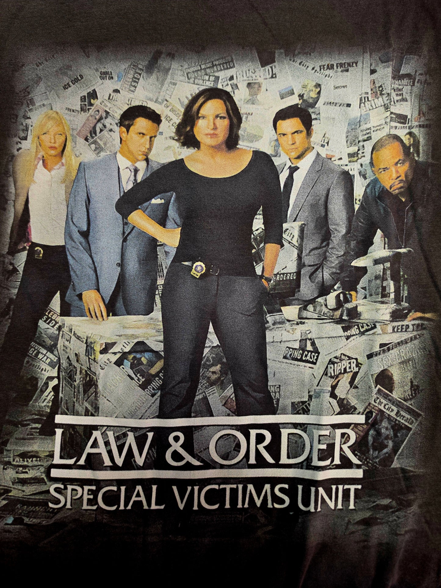 Law & Order: SVU t-shirt features a vintage-inspired graphic of the cast from the popular crime drama.