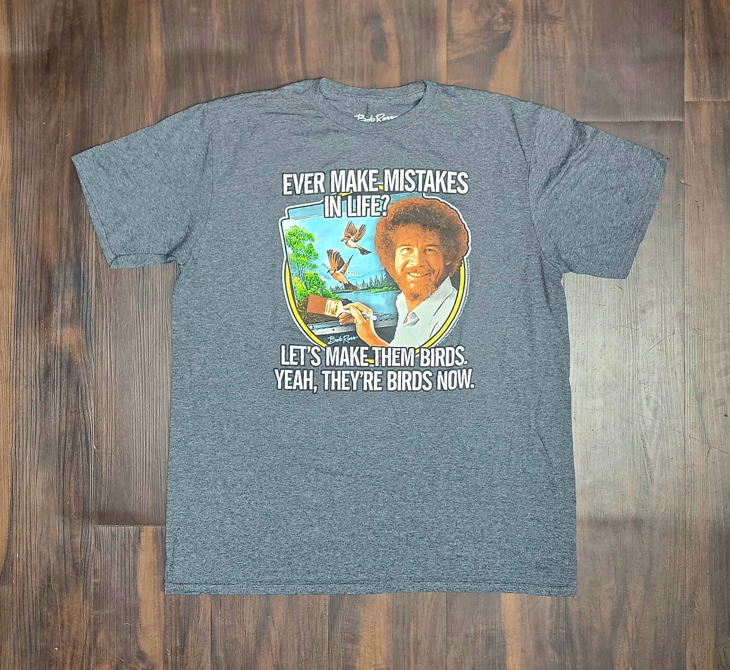 Bob Ross "Ever /make mistakes in life? Let's make them birds, yeah the'yre birds now." Grey Graphic T-Shirt Size: Large
