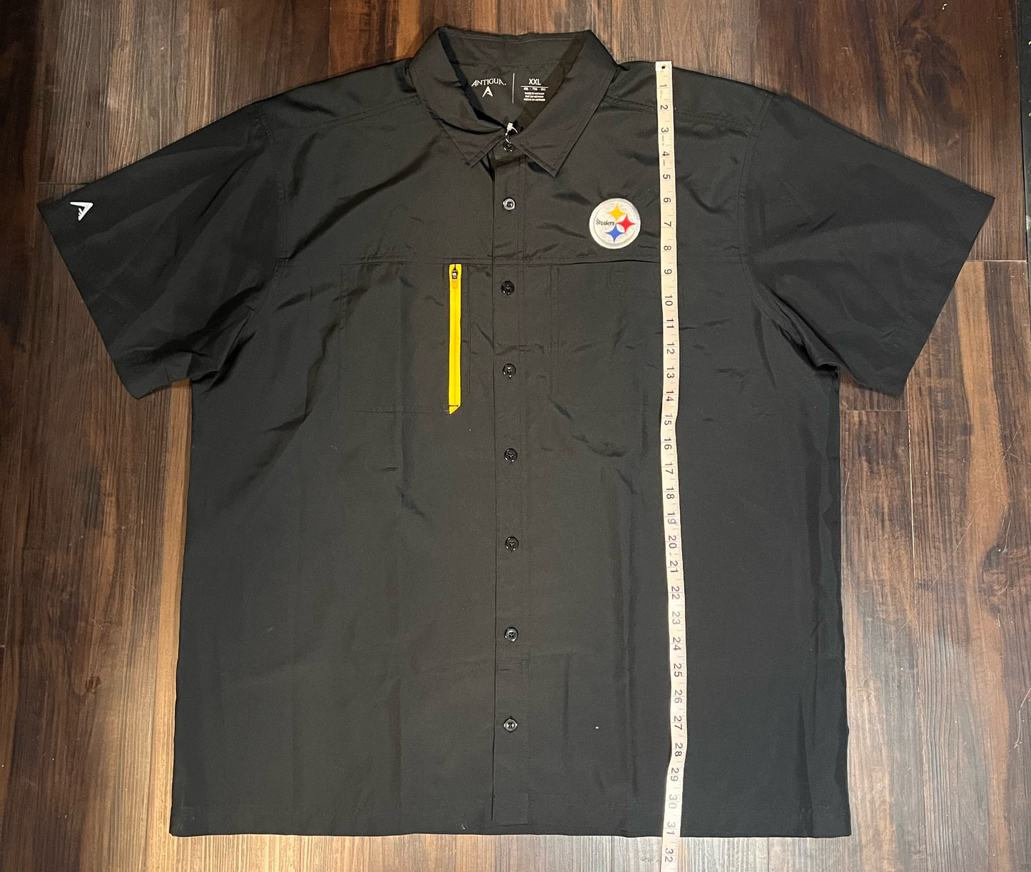 Pittsburgh Steelers Antigua short sleeve black kick off button up dress shirt w/ sipper pocket and logo on chest Size: XXLarge