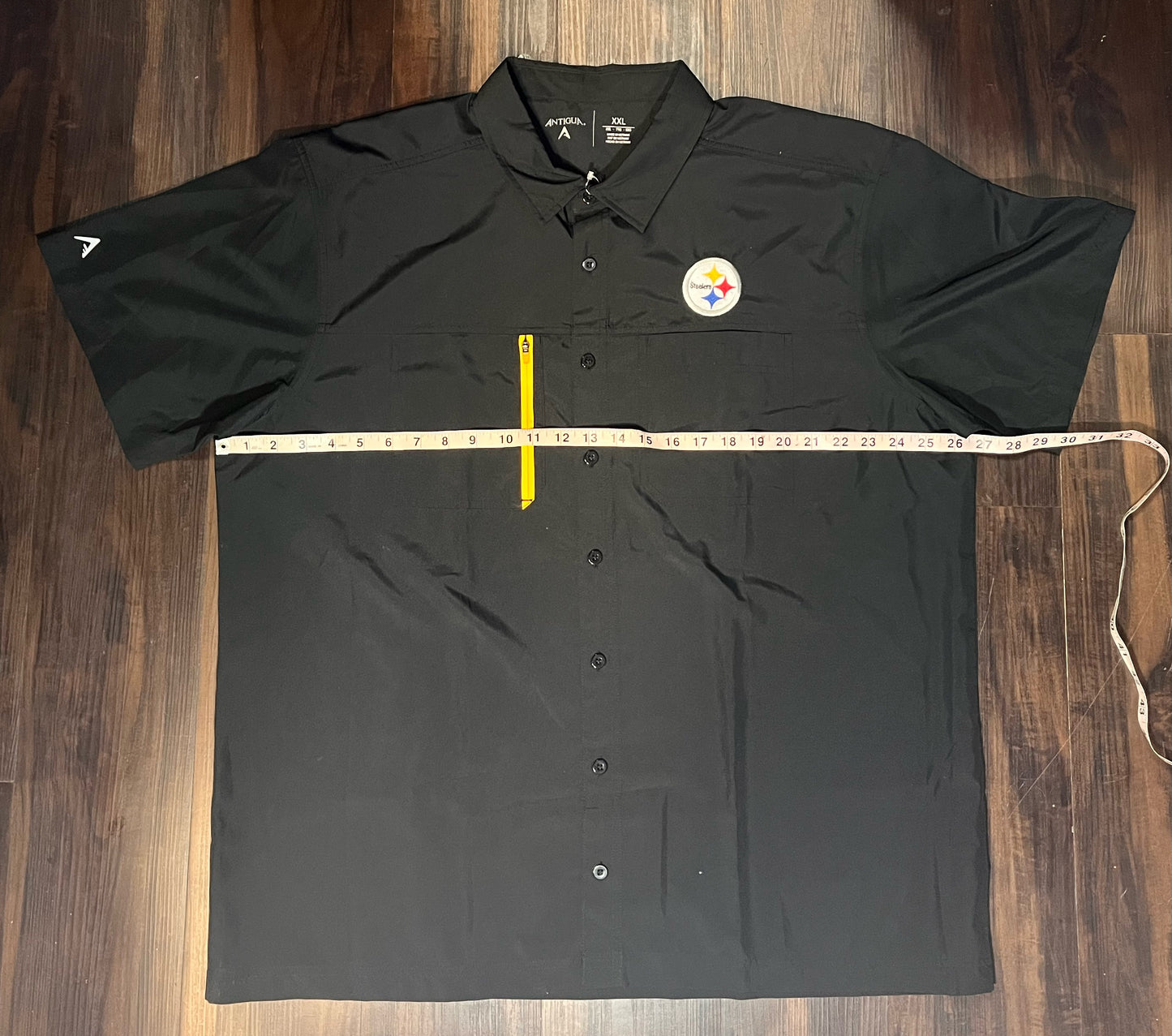 Pittsburgh Steelers Antigua short sleeve black kick off button up dress shirt w/ sipper pocket and logo on chest Size: XXLarge